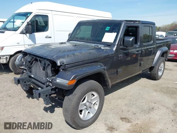 ✅ 2022 Jeep Gladiator Willys Sport • VIN: 1C6HJTAG4NL168041 • Лот: 41886627. Опубликован ранее на IAAI с пробегом 23 301 миль. Бесплатный доступ к архиву аукционных продаж из США и подробный отчёт об истории автомобиля на DreamBid. Изображение 2.