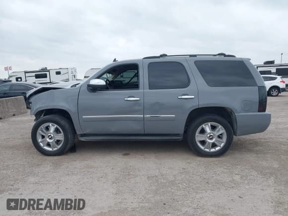 ✅ 2009 Chevrolet Tahoe LTZ • VIN: 1GNFC33099R297719 • Lot: 42064490. Listed on IAAI with 215,466 mi. Free auction sales archive from the USA and detailed vehicle history report at DreamBid. Image 15.
