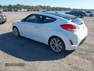 2012 Hyundai Veloster w/Red Int с VIN KMHTC6AD6CU028161, выставлен на аукционе IAAI как лот 43564329 с пробегом 98 673 миль миль и . История ставок и продаж доступна на DreamBid. Изображение 3.