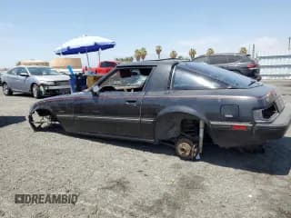 ✅ 1985 Mazda RX-7 • VIN: JM1FB3311F0869855 • Lot: 66770464. Wystawiony na Copart z przebiegiem 177 195 mil. Bezpłatny archiwum sprzedaży aukcyjnych z USA i szczegółowy raport historii pojazdu na DreamBid. Zdjęcie 2.