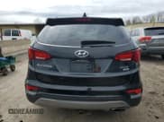✅ 2017 Hyundai Santa Fe 2.4L • VIN: 5XYZUDLB0HG389096 • Лот: 51466394. Опубликован ранее на Copart с пробегом 160 349 миль. Бесплатный доступ к архиву аукционных продаж из США и подробный отчёт об истории автомобиля на DreamBid. Изображение 6.