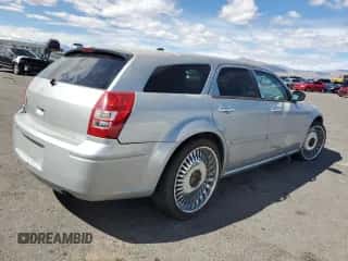 2005 Dodge Magnum SE с VIN 2D4FV48T15H642766, выставлен на аукционе Copart как лот 48261995 с пробегом 95 392 миль миль и Чистый • Clean title. История ставок и продаж доступна на DreamBid. Изображение 3.