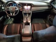 ✅ 2020 Honda Civic EX-L • VIN: 19XFC1F74LE021442 • Lot: 82461615. Listed on Copart with 99,334 mi. Free auction sales archive from the USA and detailed vehicle history report at DreamBid. Image 8.