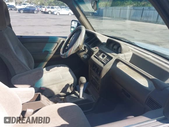 ✅ 1994 Mitsubishi Montero • VIN: JA4MR41H4RJ011555 • Lot: 43121465. Listed on IAAI with 129,891 mi. Free auction sales archive from the USA and detailed vehicle history report at DreamBid. Image 5.