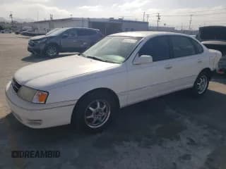 ✅ 1999 Toyota Avalon XL • VIN: 4T1BF18B9XU323397 • Лот: 77034064. Опубликован ранее на Copart с пробегом 236 026 миль. Бесплатный доступ к архиву аукционных продаж из США и подробный отчёт об истории автомобиля на DreamBid. Изображение 1.