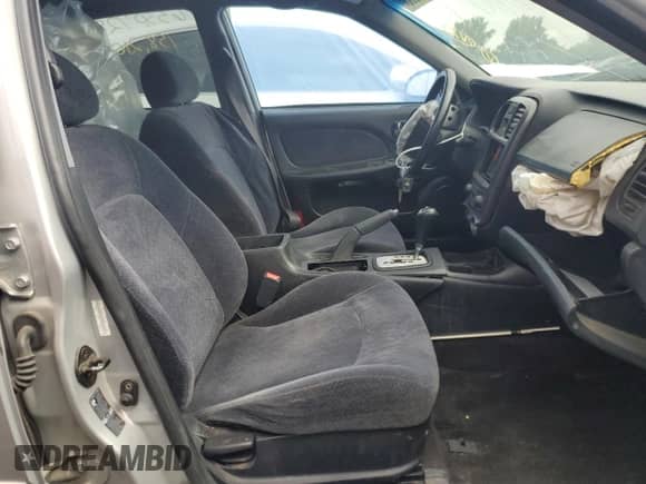 2002 Hyundai Sonata GL с VIN KMHWF25H12A643629, выставлен на аукционе Copart как лот 63307285 с пробегом 158 210 миль миль и Списание • Salvage title. История ставок и продаж доступна на DreamBid. Изображение 7.