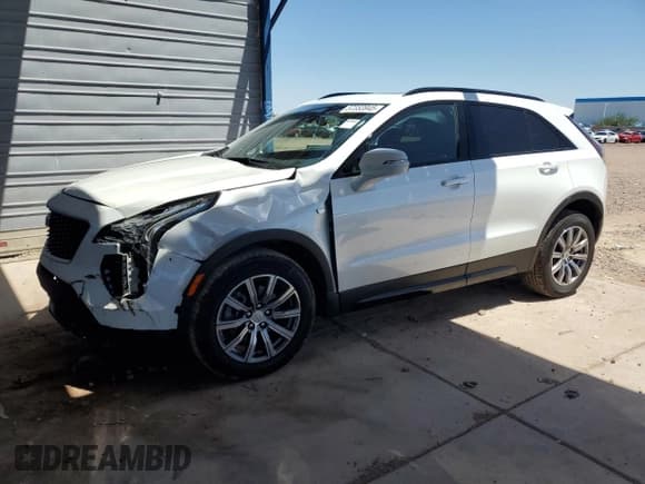 ✅ 2023 Cadillac XT4 AWD Sport • VIN: 1GYFZFR40PF211337 • Лот: 57353945. Опубликован ранее на Copart с пробегом 23 497 миль. Бесплатный доступ к архиву аукционных продаж из США и подробный отчёт об истории автомобиля на DreamBid. Изображение 1.