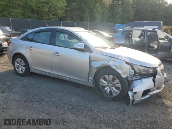 2014 Chevrolet Cruze LS z VIN 1G1PA5SH4E7202097, wystawiony jako Copart lot #84544765 z przebiegiem 184 145 mil mil oraz Szkoda całkowita • Salvage title. Historia ofert i sprzedaży dostępna na DreamBid. Obrazek 4.