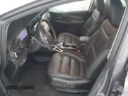 ✅ 2023 Chevrolet Bolt EV 2LT • VIN: 1G1FX6S03P4207497 • Lot: 83423604. Wystawiony na Copart z przebiegiem 11 999 mil. Bezpłatny archiwum sprzedaży aukcyjnych z USA i szczegółowy raport historii pojazdu na DreamBid. Zdjęcie 7.