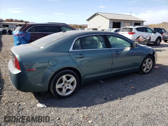 ✅ 2009 Chevrolet Malibu 1LS • VIN: 1G1ZG57B39F233414 • Lot: 77423764. Listed on Copart with 164,099 mi. Free auction sales archive from the USA and detailed vehicle history report at DreamBid. Image 3.