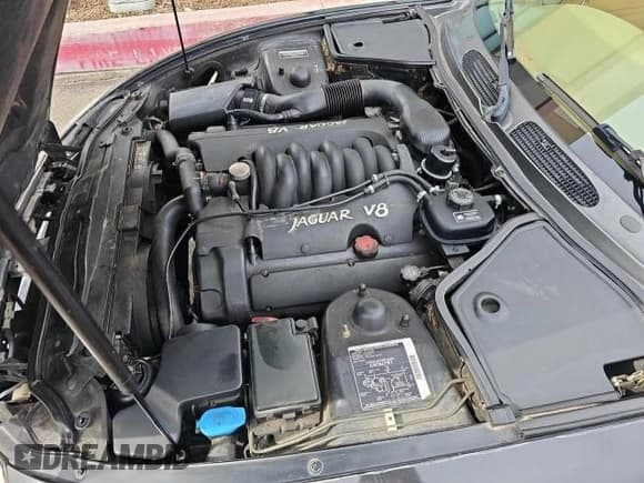 ✅ 1997 Jaguar XK • VIN: SAJGX5747VC007213 • Lot: 45953175. Wystawiony na Copart z przebiegiem 82 461 mil. Bezpłatny archiwum sprzedaży aukcyjnych z USA i szczegółowy raport historii pojazdu na DreamBid. Zdjęcie 7.