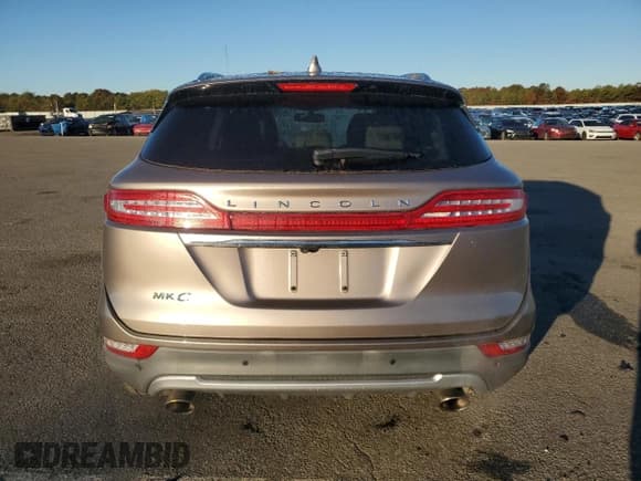 ✅ 2019 Lincoln MKC Select • VIN: 5LMCJ2D91KUL15991 • Lot: 82529215. Listed on Copart with 57,353 mi. Free auction sales archive from the USA and detailed vehicle history report at DreamBid. Image 6.