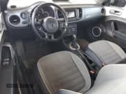 ✅ 2016 Volkswagen Beetle Denim • VIN: 3VW507AT7GM814044 • Lot: 59352315. Listed on Copart with Not provided. Free auction sales archive from the USA and detailed vehicle history report at DreamBid. Image 8.