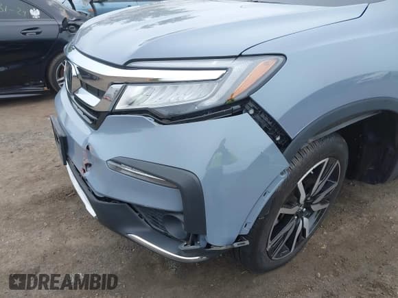 ✅ 2022 Honda Pilot Touring 7-Passenger • VIN: 5FNYF6H68NB056077 • Lot: 42357338. Listed on IAAI with 18,193 mi. Free auction sales archive from the USA and detailed vehicle history report at DreamBid. Image 6.