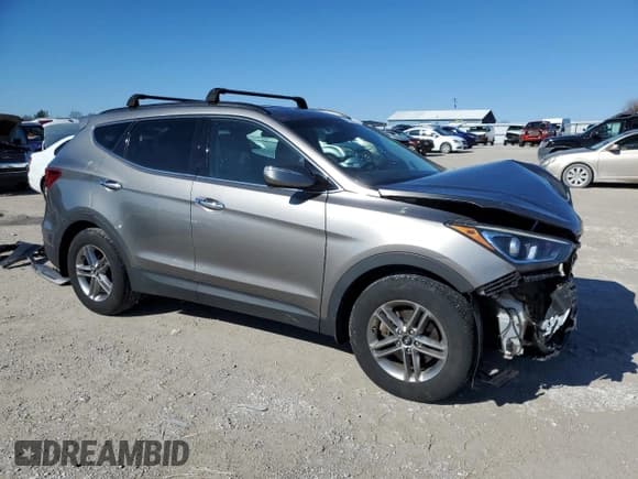 ✅ 2017 Hyundai Santa Fe 2.4L • VIN: 5NMZUDLB9HH050262 • Лот: 41228764. Опубликован ранее на Copart с пробегом 89 741 миль. Бесплатный доступ к архиву аукционных продаж из США и подробный отчёт об истории автомобиля на DreamBid. Изображение 4.