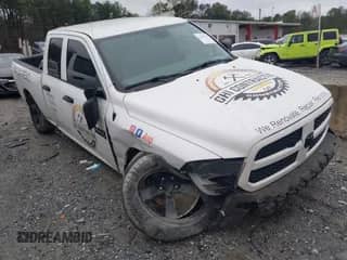 2018 Ram 1500 Tradesman z VIN 1C6RR6FG3JS147382, wystawiony jako IAAI lot #41251352 z przebiegiem 166 066 mil mil oraz . Historia ofert i sprzedaży dostępna na DreamBid. Obrazek 1.