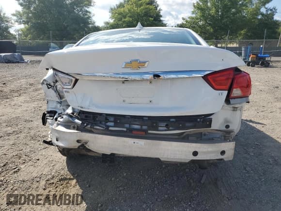 ✅ 2018 Chevrolet Impala LT • VIN: 2G1105S30J9129719 • Лот: 67974384. Опубликован ранее на Copart с пробегом 96 164 миль. Бесплатный доступ к архиву аукционных продаж из США и подробный отчёт об истории автомобиля на DreamBid. Изображение 6.