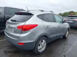 2013 Hyundai Tucson GLS with VIN KM8JU3AC1DU598337, listed as a IAAI auction lot 43555496 with 195,348 mi miles and . Bid and sale history available at DreamBid. Image 4.