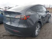 ✅ 2023 Tesla Model Y Long Range • VIN: 7SAYGDEE1PA067194 • Lot: 43689576. Listed on IAAI with 18,136 mi. Free auction sales archive from the USA and detailed vehicle history report at DreamBid. Image 4.