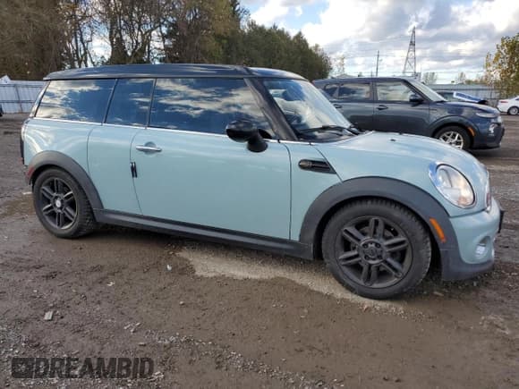 ✅ 2013 MINI Clubman • VIN: WMWZF3C56DT491092 • Lot: 86463935. Listed on Copart with 153,440 mi. Free auction sales archive from the USA and detailed vehicle history report at DreamBid. Image 4.