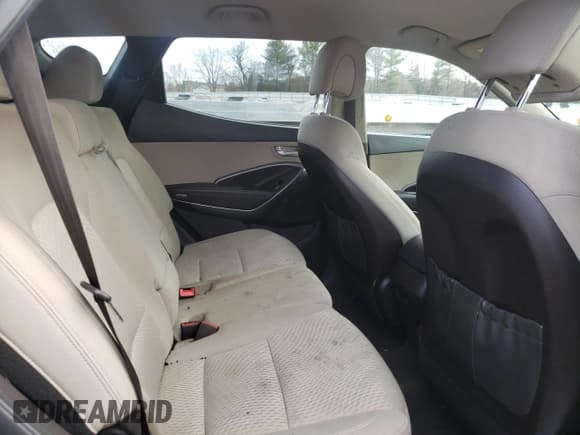 ✅ 2018 Hyundai Santa Fe 2.4L • VIN: 5NMZT3LB5JH069006 • Лот: 37106213. Опубликован ранее на Copart с пробегом 63 120 миль. Бесплатный доступ к архиву аукционных продаж из США и подробный отчёт об истории автомобиля на DreamBid. Изображение 10.