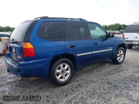 ✅ 2006 GMC Envoy SLE • VIN: 1GKDT13S362300659 • Lot: 42376597. Listed on IAAI with 261,316 mi. Free auction sales archive from the USA and detailed vehicle history report at DreamBid. Image 4.