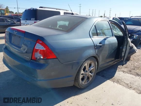 ✅ 2012 Ford Fusion SE • VIN: 3FAHP0HG3CR312324 • Lot: 43588313. Listed on IAAI with Not provided. Free auction sales archive from the USA and detailed vehicle history report at DreamBid. Image 4.