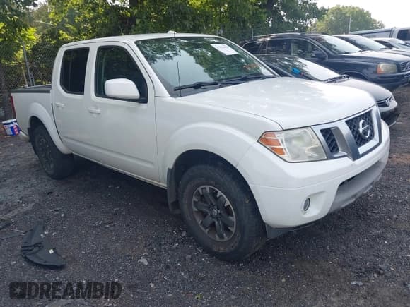 ✅ 2015 Nissan Frontier S • VIN: 1N6AD0EV0FN717018 • Lot: 42322428. Listed on IAAI with 104,715 mi. Free auction sales archive from the USA and detailed vehicle history report at DreamBid. Image 1.