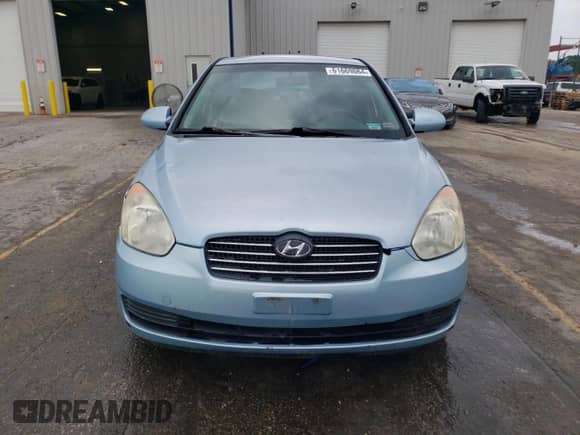 2007 Hyundai Accent GLS with VIN KMHCN46CX7U132172, listed as a Copart auction lot 61669064 with 220,897 mi miles and Salvage title. Bid and sale history available at DreamBid. Image 5.