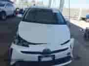 2021 Toyota Prius L Eco with VIN JTDKAMFU4M3134943, listed as a IAAI auction lot 43175713 with 106,611 mi miles and . Bid and sale history available at DreamBid. Image 13.