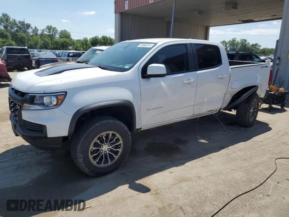 ✅ 2022 Chevrolet Colorado 4WD ZR2 • VIN: 1GCGTEENXN1251603 • Лот: 58966914. Опубликован ранее на Copart с пробегом 23 546 миль. Бесплатный доступ к архиву аукционных продаж из США и подробный отчёт об истории автомобиля на DreamBid. Изображение 1.