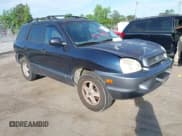 ✅ 2004 Hyundai Santa Fe GLS • VIN: KM8SC73D84U841923 • Lot: 42182384. Listed on IAAI with 121,287 mi. Free auction sales archive from the USA and detailed vehicle history report at DreamBid. Image 1.