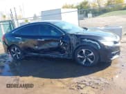 ✅ 2017 Honda Civic Touring • VIN: 19XFC1F99HE025978 • Lot: 43544695. Listed on IAAI with 123,323 mi. Free auction sales archive from the USA and detailed vehicle history report at DreamBid. Image 6.