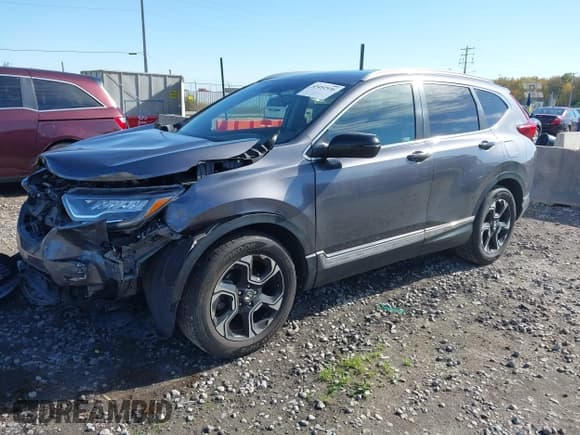 ✅ 2018 Honda CR-V Touring • VIN: 7FARW2H91JE038560 • Лот: 43492936. Опубликован ранее на IAAI с пробегом 94 898 миль. Бесплатный доступ к архиву аукционных продаж из США и подробный отчёт об истории автомобиля на DreamBid. Изображение 2.