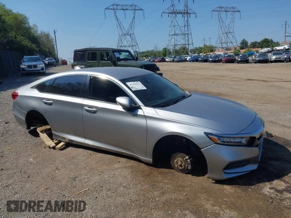 ✅ 2018 Honda Accord LX • VIN: 1HGCV1F11JA128295 • Lot: 43258593. Listed on IAAI with 113,972 mi. Free auction sales archive from the USA and detailed vehicle history report at DreamBid. Image 17.