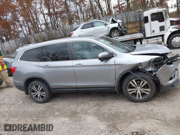✅ 2018 Honda Pilot EX-L • VIN: 5FNYF6H59JB013630 • Lot: 43644866. Listed on IAAI with 90,321 mi. Free auction sales archive from the USA and detailed vehicle history report at DreamBid. Image 13.