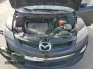 ✅ 2012 Mazda CX-7 i SV • VIN: JM3ER2AM5C0412158 • Lot: 92886055. Wystawiony na Copart z przebiegiem 221 977 mil. Bezpłatny archiwum sprzedaży aukcyjnych z USA i szczegółowy raport historii pojazdu na DreamBid. Zdjęcie 11.