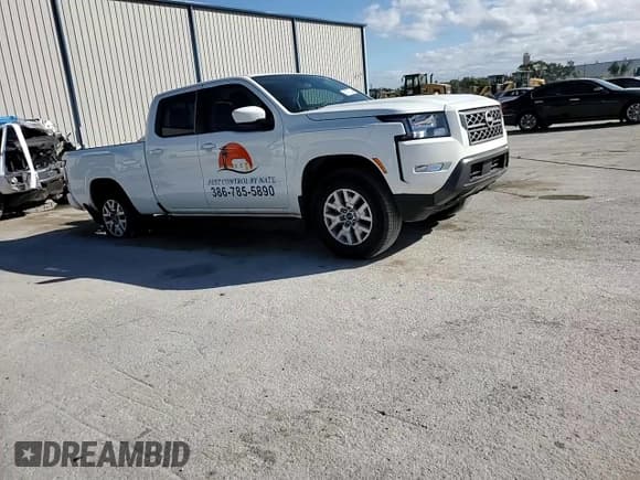 ✅ 2024 Nissan Frontier SV • VIN: 1N6ED1FK2RN657923 • Lot: 84277234. Listed on Copart with 9,165 mi. Free auction sales archive from the USA and detailed vehicle history report at DreamBid. Image 13.