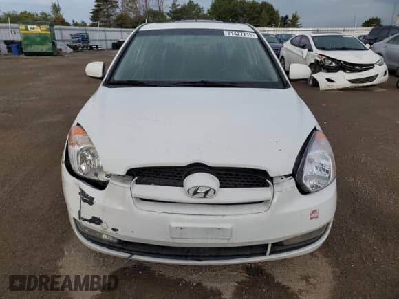 2011 Hyundai Accent L with VIN KMHCN3BC6BU205515, listed as a Copart auction lot 71427715 with 127,225 mi miles and Salvage title. Bid and sale history available at DreamBid. Image 5.
