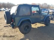 ✅ 2002 Jeep Wrangler Sport • VIN: 1J4FA49S52P755359 • Лот: 43712663. Опубликован ранее на IAAI с пробегом 144 014 миль. Бесплатный доступ к архиву аукционных продаж из США и подробный отчёт об истории автомобиля на DreamBid. Изображение 4.