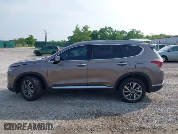 2019 Hyundai Santa Fe Ultimate z VIN 5NMS53AD8KH061810, wystawiony jako IAAI lot #42481330 z przebiegiem 96 030 mil mil oraz . Historia ofert i sprzedaży dostępna na DreamBid. Obrazek 14.