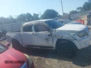 ✅ 2010 Toyota Tacoma PreRunner • VIN: 3TMJU4GNXAM103720 • Lot: 42994037. Listed on IAAI with 214,592 mi. Free auction sales archive from the USA and detailed vehicle history report at DreamBid. Image 13.