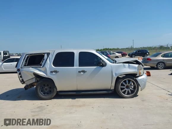 ✅ 2014 Chevrolet Tahoe Commercial • VIN: 1GNLC2E06ER179552 • Lot: 43008501. Listed on IAAI with Not provided. Free auction sales archive from the USA and detailed vehicle history report at DreamBid. Image 13.