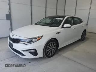 ✅ 2020 Kia Optima EX Premium • VIN: 5XXGU4L10LG449275 • Lot: 64858675. Wystawiony na Copart z przebiegiem 79 660 mil. Bezpłatny archiwum sprzedaży aukcyjnych z USA i szczegółowy raport historii pojazdu na DreamBid. Zdjęcie 1.