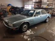 ✅ 1992 Jaguar XJ • VIN: SAJKY1745NC649347 • Lot: 41523718. Listed on IAAI with 159,926 mi. Free auction sales archive from the USA and detailed vehicle history report at DreamBid. Image 2.