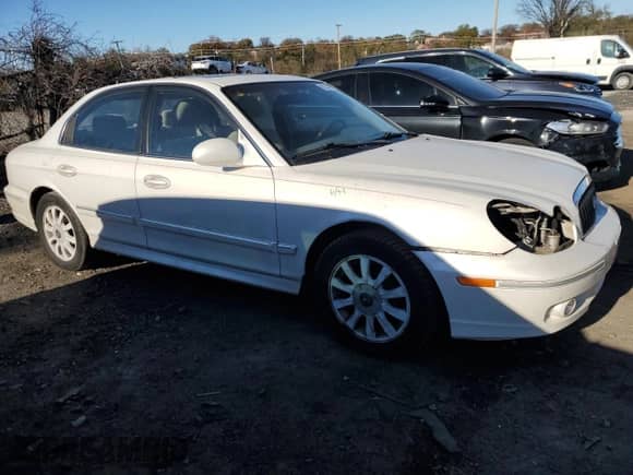 2003 Hyundai Sonata GLS with VIN KMHWF35H83A884496, listed as a Copart auction lot 80327514 with 162,372 mi miles and Salvage title. Bid and sale history available at DreamBid. Image 4.