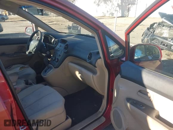 ✅ 2007 Kia Rondo EX • VIN: KNAFG526277118232 • Lot: 43857519. Listed on IAAI with 129,510 mi. Free auction sales archive from the USA and detailed vehicle history report at DreamBid. Image 5.