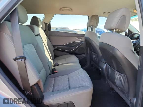 2017 Hyundai Santa Fe SE z VIN KM8SM4HF3HU235974, wystawiony jako Copart lot #82238885 z przebiegiem 98 649 mil mil oraz Szkoda całkowita • Salvage title. Historia ofert i sprzedaży dostępna na DreamBid. Obrazek 11.