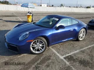 ✅ 2022 Porsche 911 Carrera • VIN: WP0AA2A99NS205256 • Lot: 43082515. Listed on Copart with 21,682 mi. Free auction sales archive from the USA and detailed vehicle history report at DreamBid. Image 1.