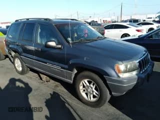 ✅ 2003 Jeep Grand Cherokee Laredo • VIN: 1J4GX48S93C618955 • Lot: 34580156. Listed on IAAI with 183,875 mi. Free auction sales archive from the USA and detailed vehicle history report at DreamBid. Image 1.